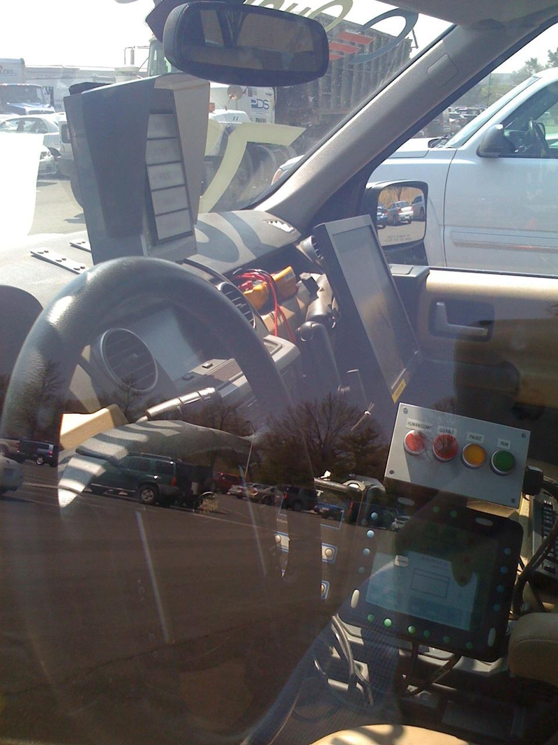 Illustration for article titled DARPA Urban Challenge Cars Invading Pentagon Parking Lot